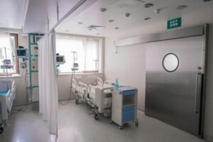 Spacious hospital room in Baku featuring medical beds and equipment.